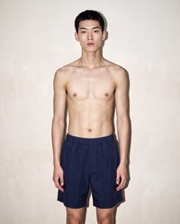 thirdofthefifth navy flat front shorts. cotton stretch comfortable. elastic waistband. unisex australian streetwear fashion