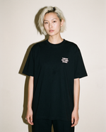 Black heavyweight cotton oversized T-shirt with large 'Throw Me Them Roses' graphic slogan printed on both on the front and the back, oversized structured box fit. unisex silhouette and premium streetwear styling.