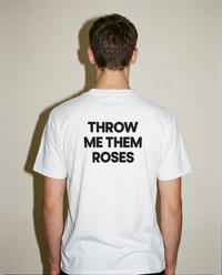 White heavyweight cotton oversized T-shirt with large 'Throw Me Them Roses' graphic slogan printed on both on the front and the back, oversized structured box fit. unisex silhouette and premium streetwear styling.